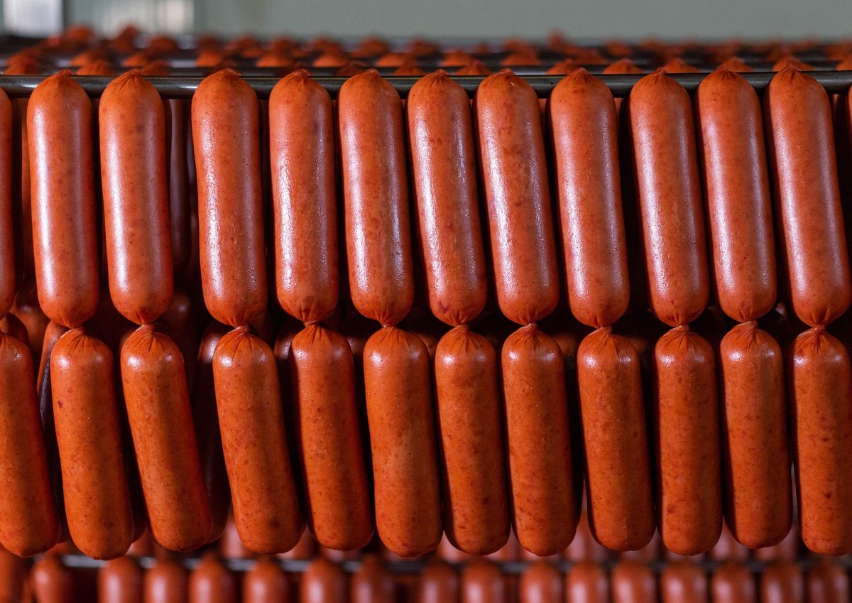 Linha de producao e ritmo de trabalho em frigorifico